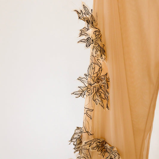 sheer trousers with machine embroidered flower design elements