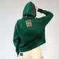 person wearing a Cropped bark pattern black hoodie with drawstring waist from the back