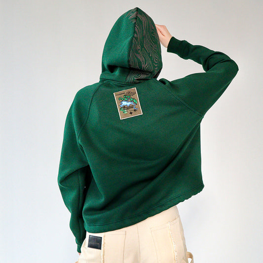 person wearing a Cropped bark pattern black hoodie with drawstring waist from the back
