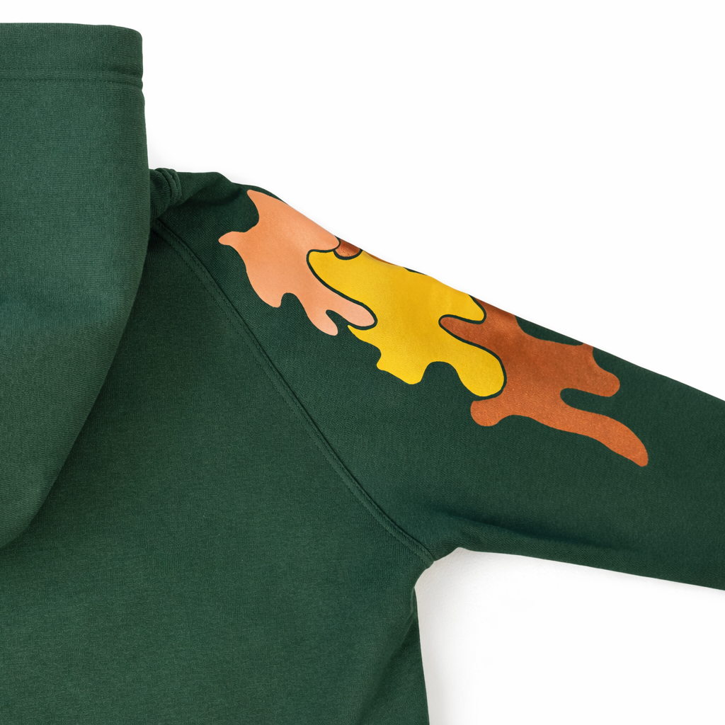 Green sweatshirt with colorful flame design on sleeve against a white background